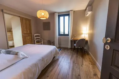 Un ou plusieurs lits dans un hébergement de l'établissement La maison d'à côté