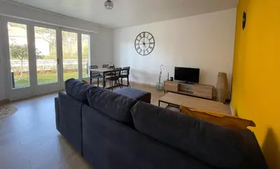 Télévision ou salle de divertissement dans l'établissement L'Ocenoa2