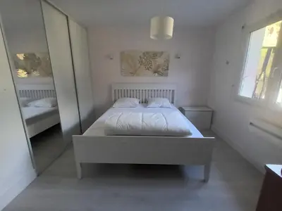 Un ou plusieurs lits dans un hébergement de l'établissement Bassin d'Arcachon belle villa moderne 4 chambres et piscine privée