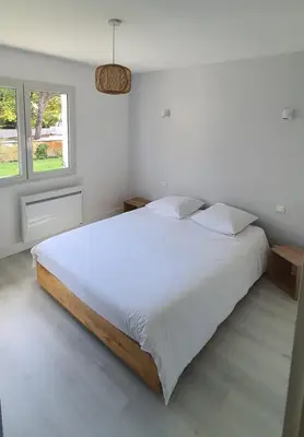 Un ou plusieurs lits dans un hébergement de l'établissement Bassin d'Arcachon belle villa moderne 4 chambres et piscine privée