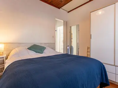 Un ou plusieurs lits dans un hébergement de l'établissement Apartment Iena by Interhome