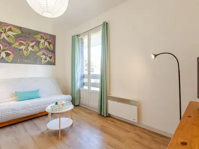 Un ou plusieurs lits dans un hébergement de l'établissement Apartment Les Bourdaines by Interhome