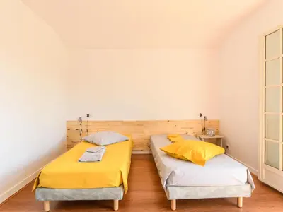 Un ou plusieurs lits dans un hébergement de l'établissement Holiday Home Les Chênes by Interhome