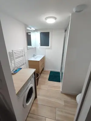Cuisine ou kitchenette dans l'établissement Maisonnette neuve plage et commerces à pied