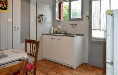 Cuisine ou kitchenette dans l'établissement Beautiful Apartment In Capbreton