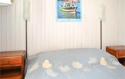 Un ou plusieurs lits dans un hébergement de l'établissement Beautiful Apartment In Capbreton