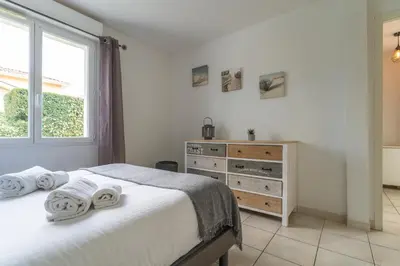 Un ou plusieurs lits dans un hébergement de l'établissement La Perlière - Avec piscine proche du golf