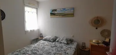 Un ou plusieurs lits dans un hébergement de l'établissement Rêve de Bisca Appartement spacieux climatisé avec jardin privatif piscine et parking privés