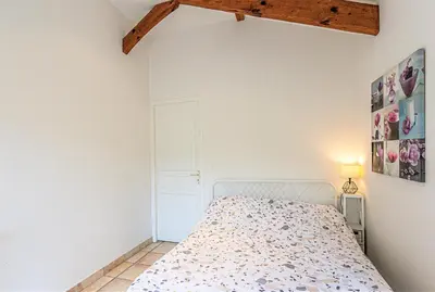 Un ou plusieurs lits dans un hébergement de l'établissement Cigalon - Hossegor - Villa Landaise avec superbe Jardin et Piscine Chauffée