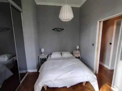 Un ou plusieurs lits dans un hébergement de l'établissement Le Moulleau Appartement 2 chambres - plage à 50m