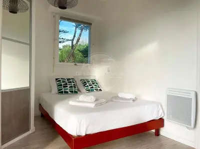 Un ou plusieurs lits dans un hébergement de l'établissement Appartement Marine