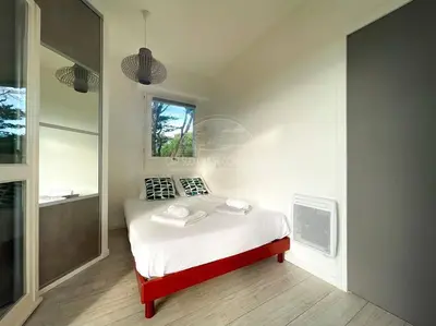 Un ou plusieurs lits dans un hébergement de l'établissement Appartement Marine