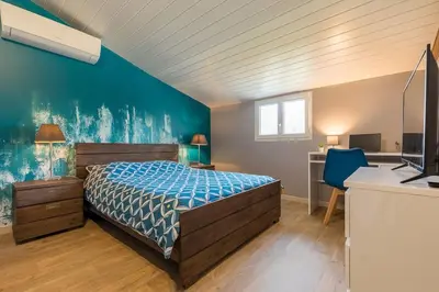 Un ou plusieurs lits dans un hébergement de l'établissement Grande maison avec SPA et sans vis-à-vis