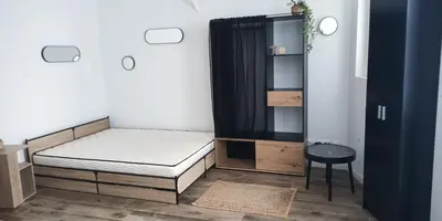 Un ou plusieurs lits dans un hébergement de l'établissement La Pierre 2 studio entier