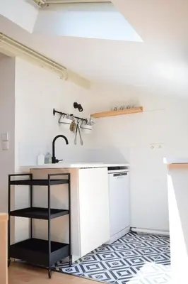 Cuisine ou kitchenette dans l'établissement Nid de Ruben, Villa Hostal Naou Hossegor Wifi Netflix Sauna