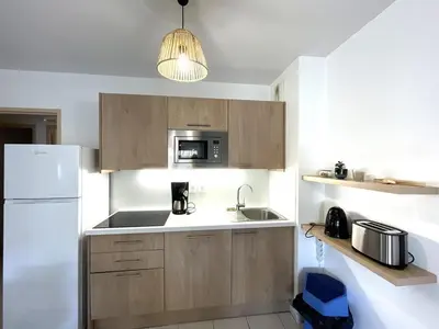 Cuisine ou kitchenette dans l'établissement T3 Cabine avec Piscine, Parking, Animaux admis à Moliets-et-Maa - FR-1-379-162