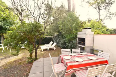 Jardin de l'établissement Anlga - Hossegor villa mitoyenne de plain pied rénovée avec jardinet clos et terrasse