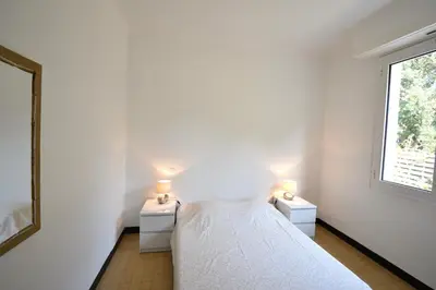 Un ou plusieurs lits dans un hébergement de l'établissement Laridente - Hossegor agréable villa située dans un quartier calme entre lac et océan