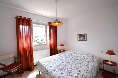 Un ou plusieurs lits dans un hébergement de l'établissement Ben et sou - Hossegor appartement avec agréable terrasse au premier étage d'une villa