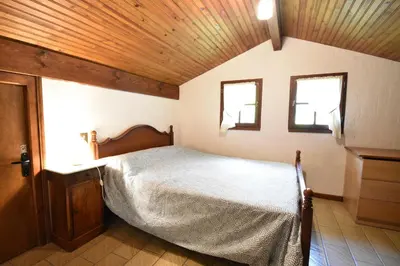 Un ou plusieurs lits dans un hébergement de l'établissement Braserade H - Seignosse agréable villa landaise sur jardin clos proche des plages et du golf