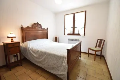 Un ou plusieurs lits dans un hébergement de l'établissement Braserade H - Seignosse agréable villa landaise sur jardin clos proche des plages et du golf