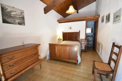 Un ou plusieurs lits dans un hébergement de l'établissement Braserade H - Seignosse agréable villa landaise sur jardin clos proche des plages et du golf