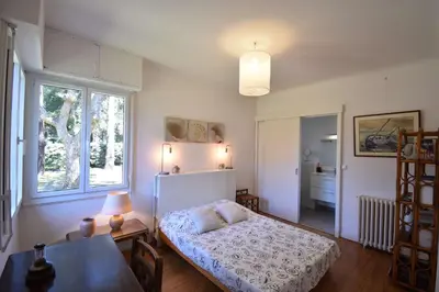 Un ou plusieurs lits dans un hébergement de l'établissement Ourika - Hossegor belle villa située proche du lac marin du centre ville et du stade