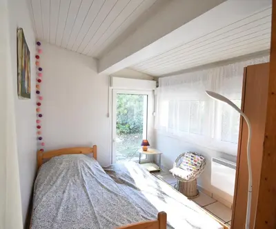 Un ou plusieurs lits dans un hébergement de l'établissement Aire Ona 1 - Hossegor appartement situé à deux pas de la plage de la gravière