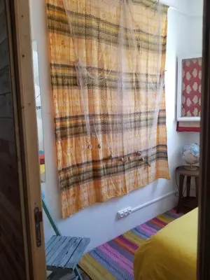 Un ou plusieurs lits dans un hébergement de l'établissement Guesthouse Évasion