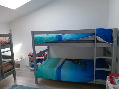 Un ou plusieurs lits dans un hébergement de l'établissement Mimizan Apt neuf 80m2 +terrasse 100m plage
