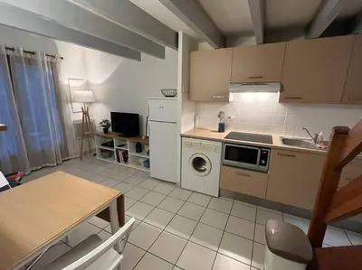 Cuisine ou kitchenette dans l'établissement Maison 400m plage