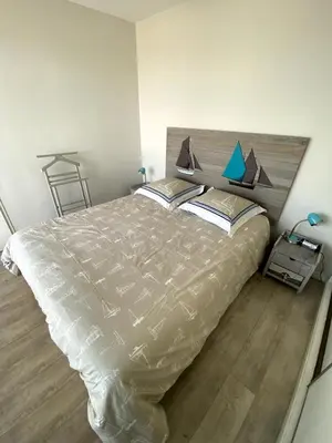 Un ou plusieurs lits dans un hébergement de l'établissement Appartement vue mer Hossegor