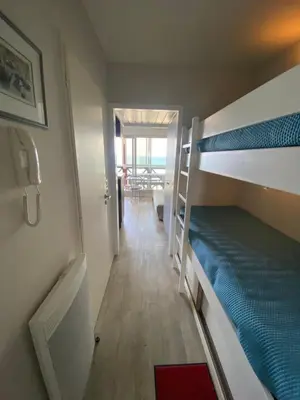 Un ou plusieurs lits dans un hébergement de l'établissement Appartement vue mer Hossegor