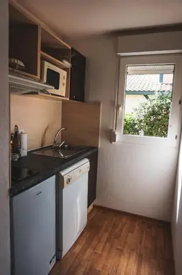 Cuisine ou kitchenette dans l'établissement Villas du lac