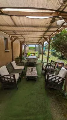 Coin salon dans l'établissement Ravissant T2, Cl 3 étoiles, 3 pers et 1 enf , 3 lits, parking et patio
