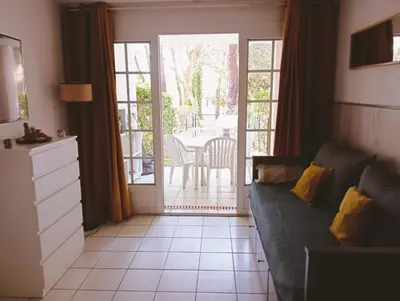 Coin salon dans l'établissement Appartement Golf et Océan