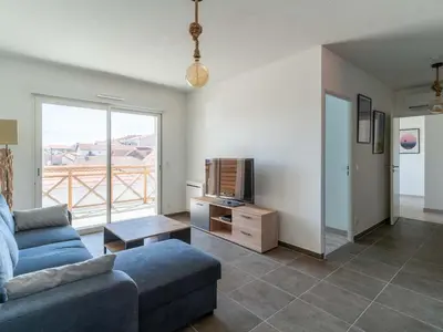 Coin salon dans l'établissement Appartement 3* à 50m de l'Océan, 5 pers, Clim, Wifi, Parking - Mimizan Plage - FR-1-50-116